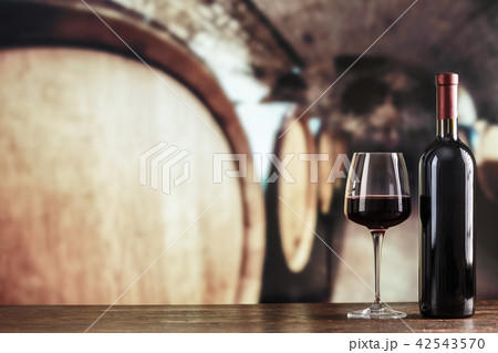 red wine in a glass on the background  42543570