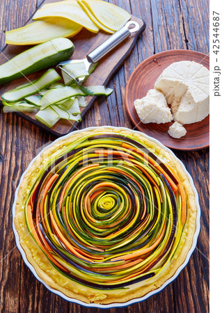 vegetable spiral tart with zucchini, eggplant vegetable spiral tart with zucchini, eggplant 42544687