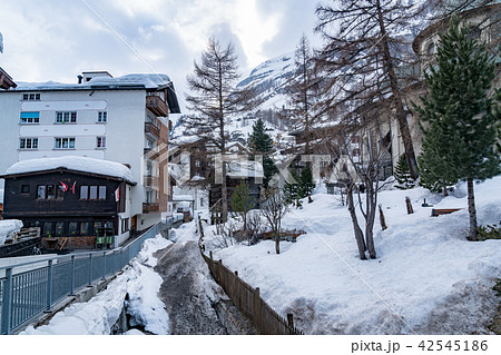 View of snowy Zermatt Village in early spring View of snowy Zermatt Village in early spring 42545186