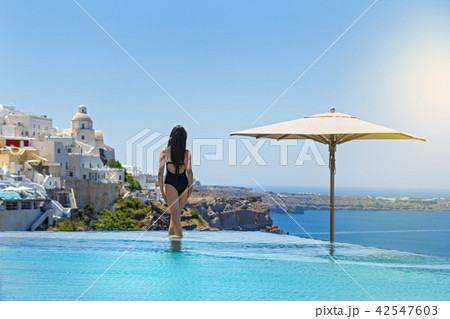 Woman in the pool 42547603