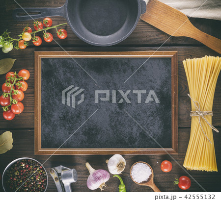 black frame and ingredients for pasta cooking 42555132
