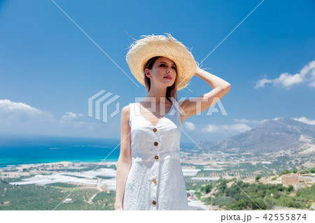 woman is posing on olive garden and sea coast background woman is posing on olive garden and sea coast background 42555874