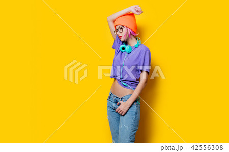 girl in purple clothes with headphones 42556308