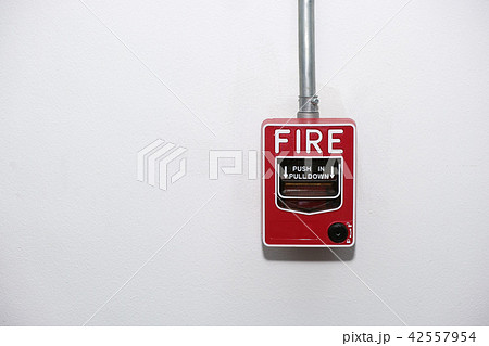 Close up fire alarm notifier on wall 42557954