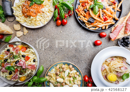 Pasta with different kinds of sauce 42568127
