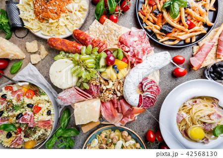Pasta with different kinds of sauce 42568130