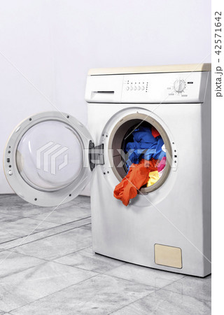 Clothes inside washing machine Clothes inside washing machine 42571642