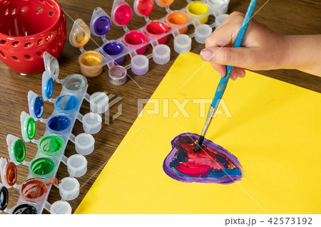 Child painting a picture. Child painting a picture. 42573192