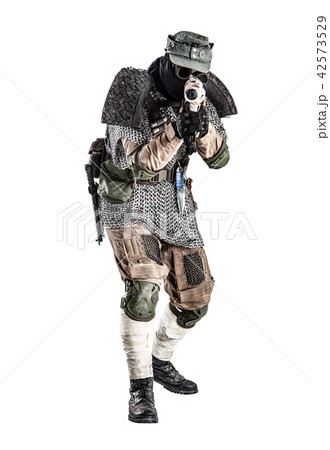 Post apocalyptic soldier aiming firearm weapon Post apocalyptic soldier aiming firearm weapon 42573529