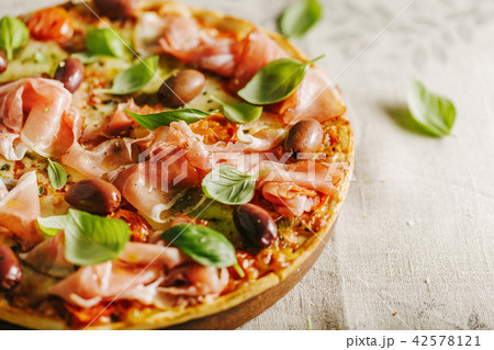 Italian pizza on rustic textile 42578121