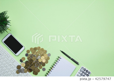 The office supplies on green background 42579747