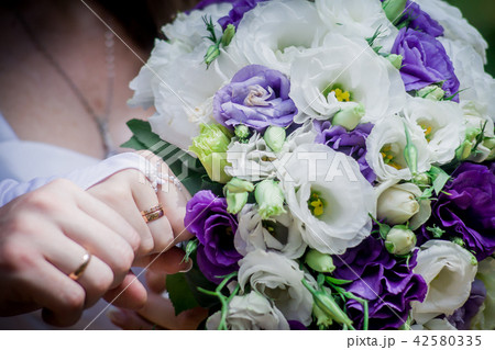 beautiful modern wedding bouquet on white table 42580335