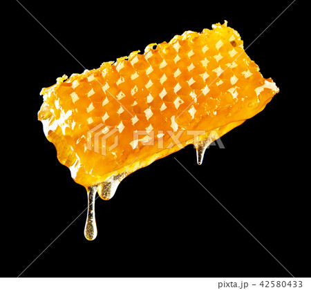 Honeycomb on black background 42580433