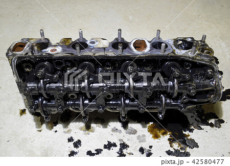 The head of the block of cylinders. The head of the block of cylinders removed from the engine for The head of the block of cylinders. The head of the block of cylinders removed from the engine for 42580477