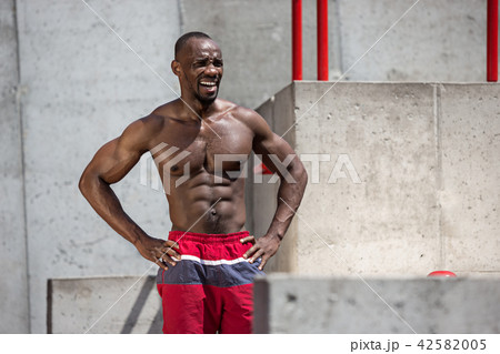 Athlete doing exercises at stadium 42582005