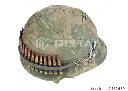 US Army helmet with camouflage cover and ammo belt US Army helmet with camouflage cover and ammo belt 42582689