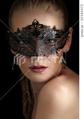 Stranger in black mask 42583475
