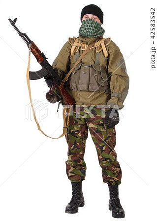 fighter with ak-47 rifle 42583542