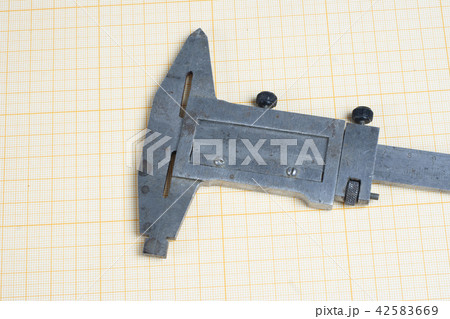 caliper on graph paper background caliper on graph paper background 42583669