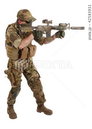 special forces operator with assault rifle on white background 42583931