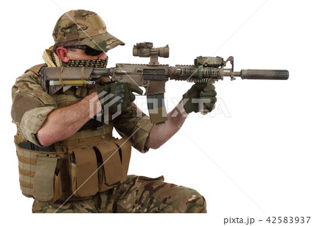 special forces operator with assault rifle on white background 42583937