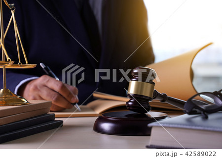 Judge gavel with Justice lawyers lawyer working   42589022