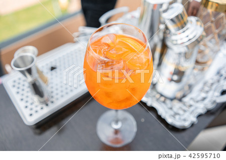 Aperol spritz cocktail in misted glass, selective focus. Alcoholic beverage based on bar counter 42595710