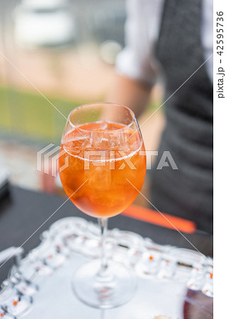 Aperol spritz cocktail in misted glass, selective focus. Alcoholic beverage based on bar counter 42595736