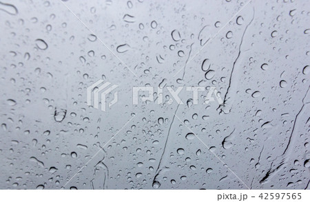 Raindrops on the windshield background Raindrops on the windshield background 42597565