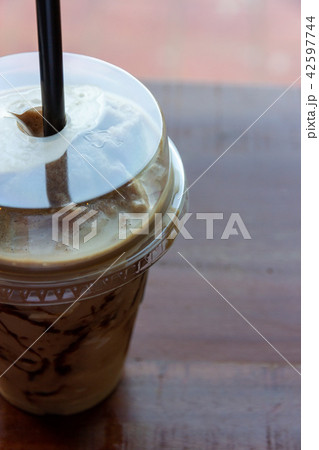 iced blended coffee with milk in plastic glass 42597744