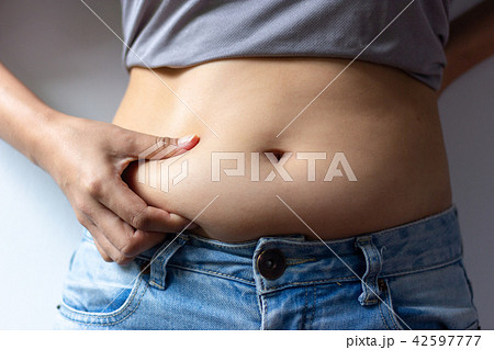 woman with overweight abdomen.  42597777