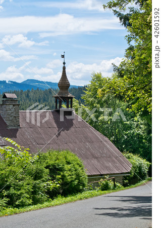 A house with smal tower in the Bohemian Forest. 42601592
