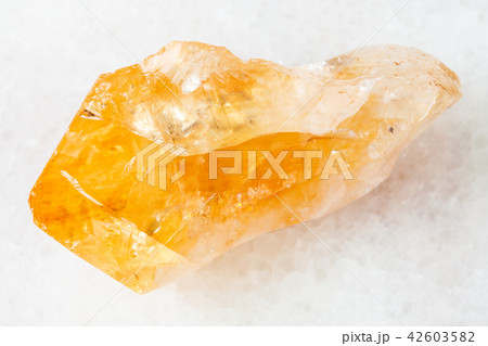 crystal of Citrine (yellow quartz) on white 42603582