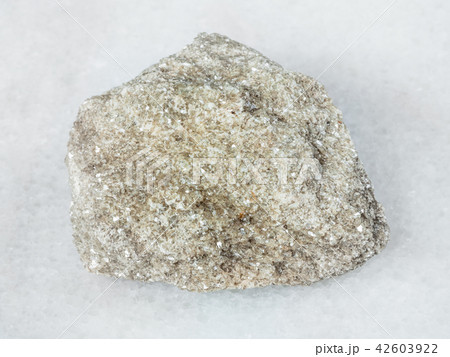 rough muscovite greisen rock on white 42603922