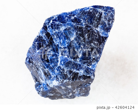 rough Sodalite gemstone on white 42604124