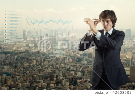 A businessman looking with spyglass for best deal 42608505