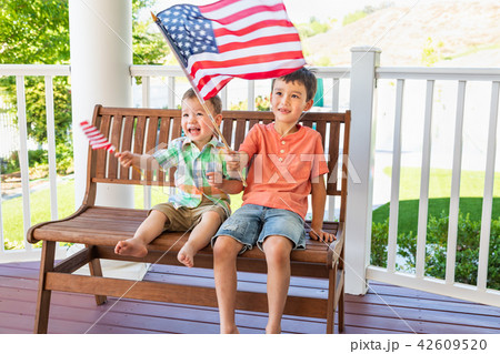 Two Mixed Race Chinese Brothers Play With Flags Two Mixed Race Chinese Brothers Play With Flags 42609520