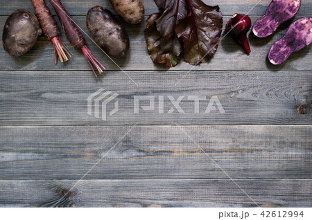 Background with various violet vegetables 42612994