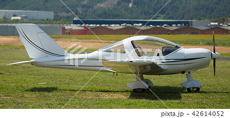 Sport airplane standing on airfield Sport airplane standing on airfield 42614052