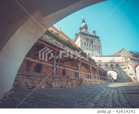 View of clock tower from fortress square in Sighisoara View of clock tower from fortress square in Sighisoara 42614241