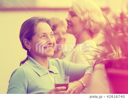 mature woman on a balcony mature woman on a balcony 42616740