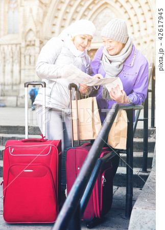 Mature ladies travellers with map Mature ladies travellers with map 42617945