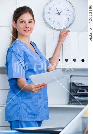 Female doctor assistant in office Female doctor assistant in office 42618196