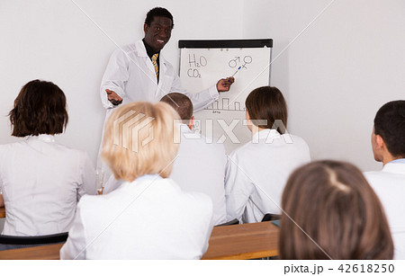doctor lecturing to colleagues at medical conference doctor lecturing to colleagues at medical conference 42618250
