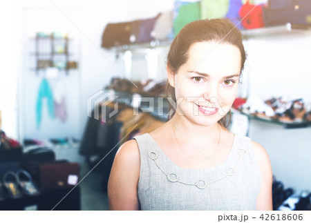 Female customer in shoes center Female customer in shoes center 42618606