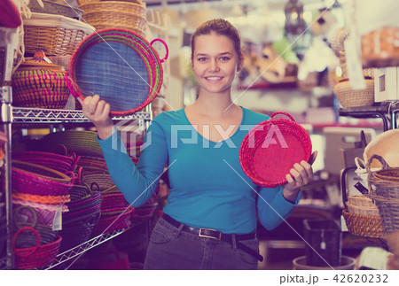 teenager girl with multicolor wicker basket teenager girl with multicolor wicker basket 42620232