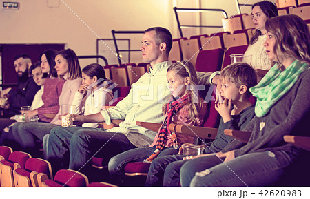 Audience attending movie night for comedy Audience attending movie night for comedy 42620983