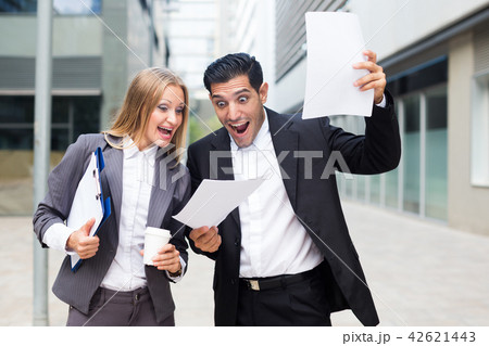 Young managers are satisfied of successful contract 42621443