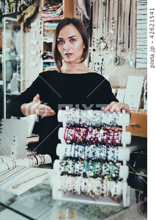 portrait of woman worker selling bracelets 42621541