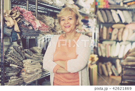 woman consumer in textile shop 42621869